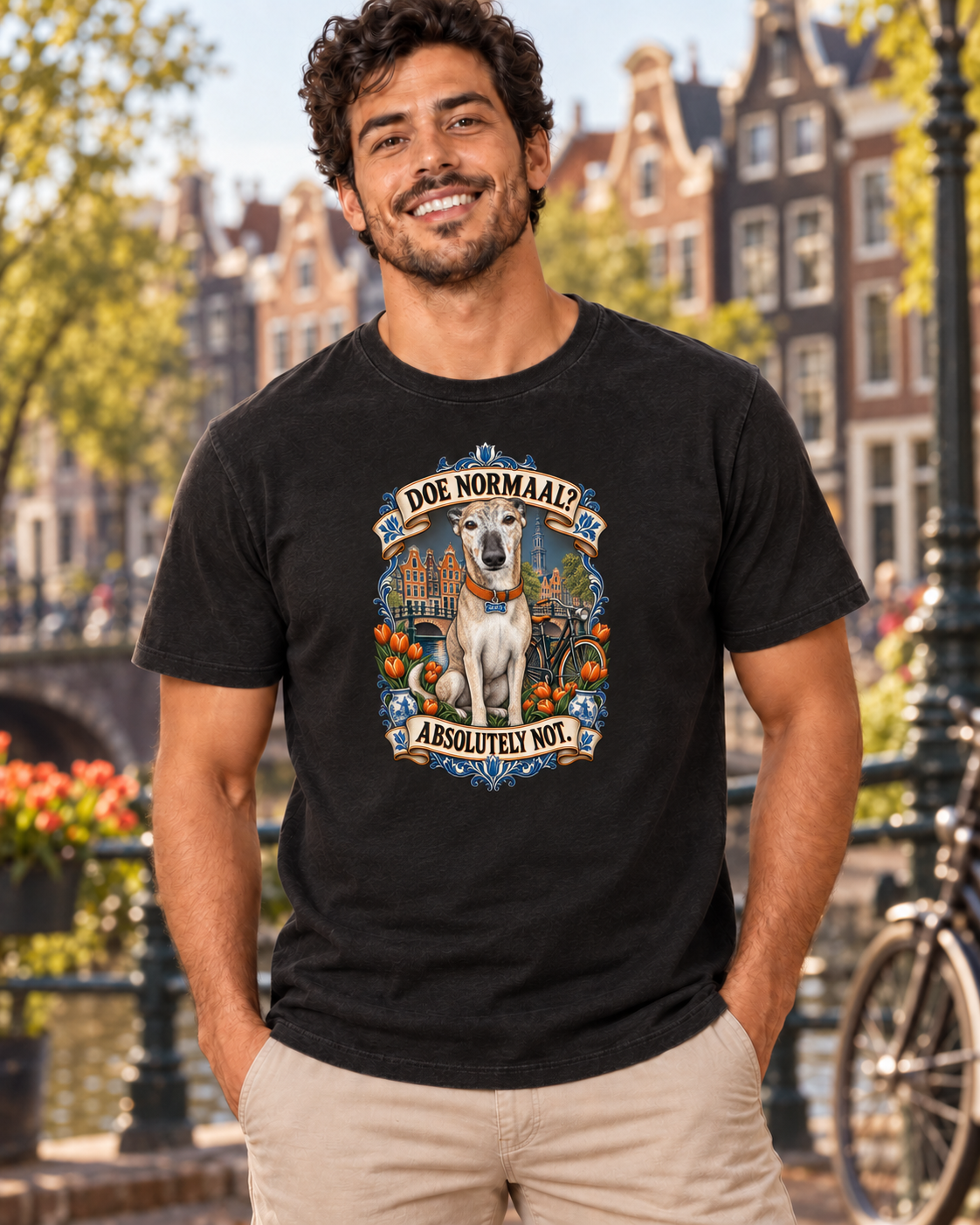 Black T-shirt featuring Dante surrounded by Dutch canal houses, bicycles, orange tulips and Delft-blue details with the words Doe Normaal and Absolutely Not.