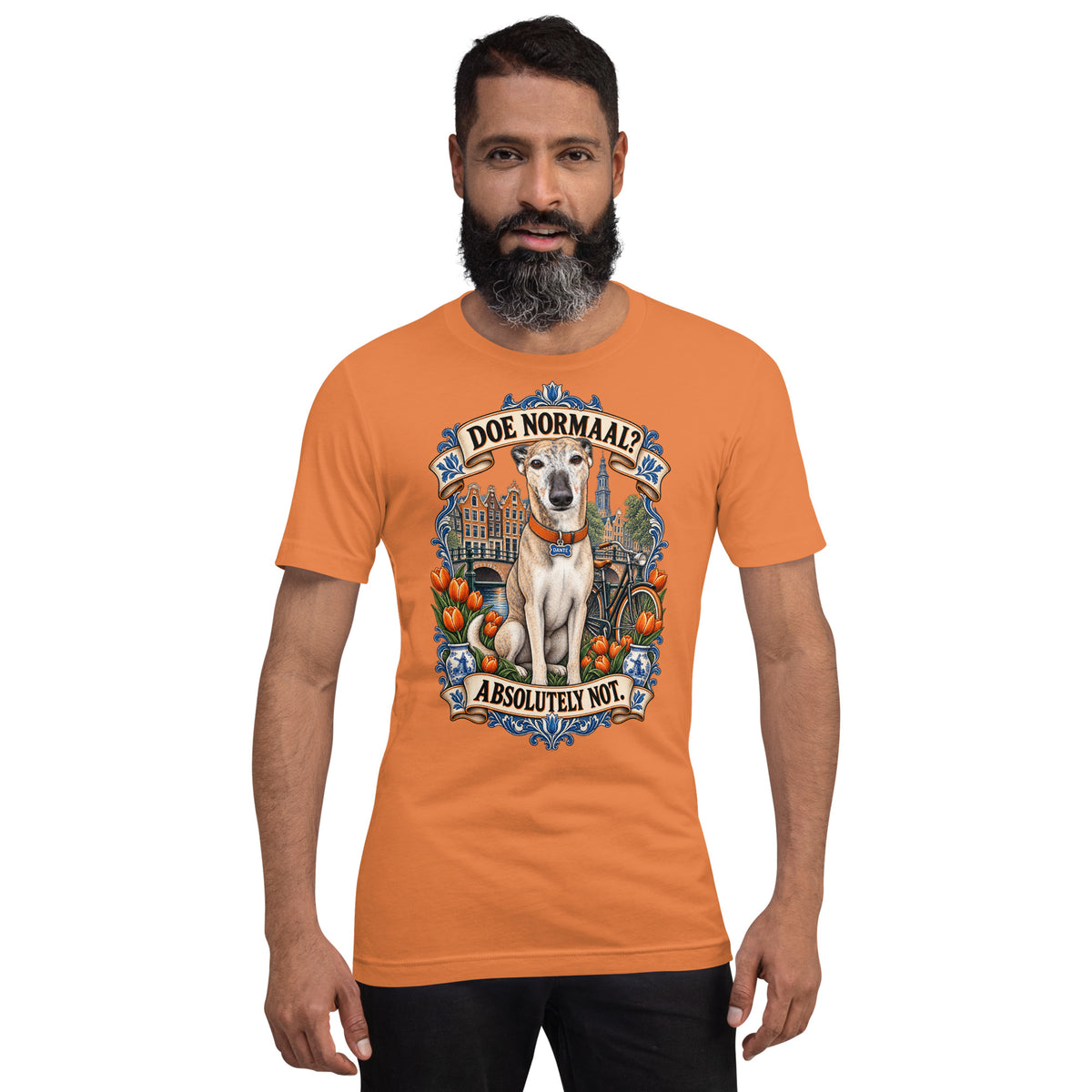 Burnt Orange T-shirt featuring Dante surrounded by Dutch canal houses, bicycles, orange tulips and Delft-blue details with the words Doe Normaal and Absolutely Not.